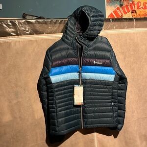 Brand new never worn ladies puffer jacket
